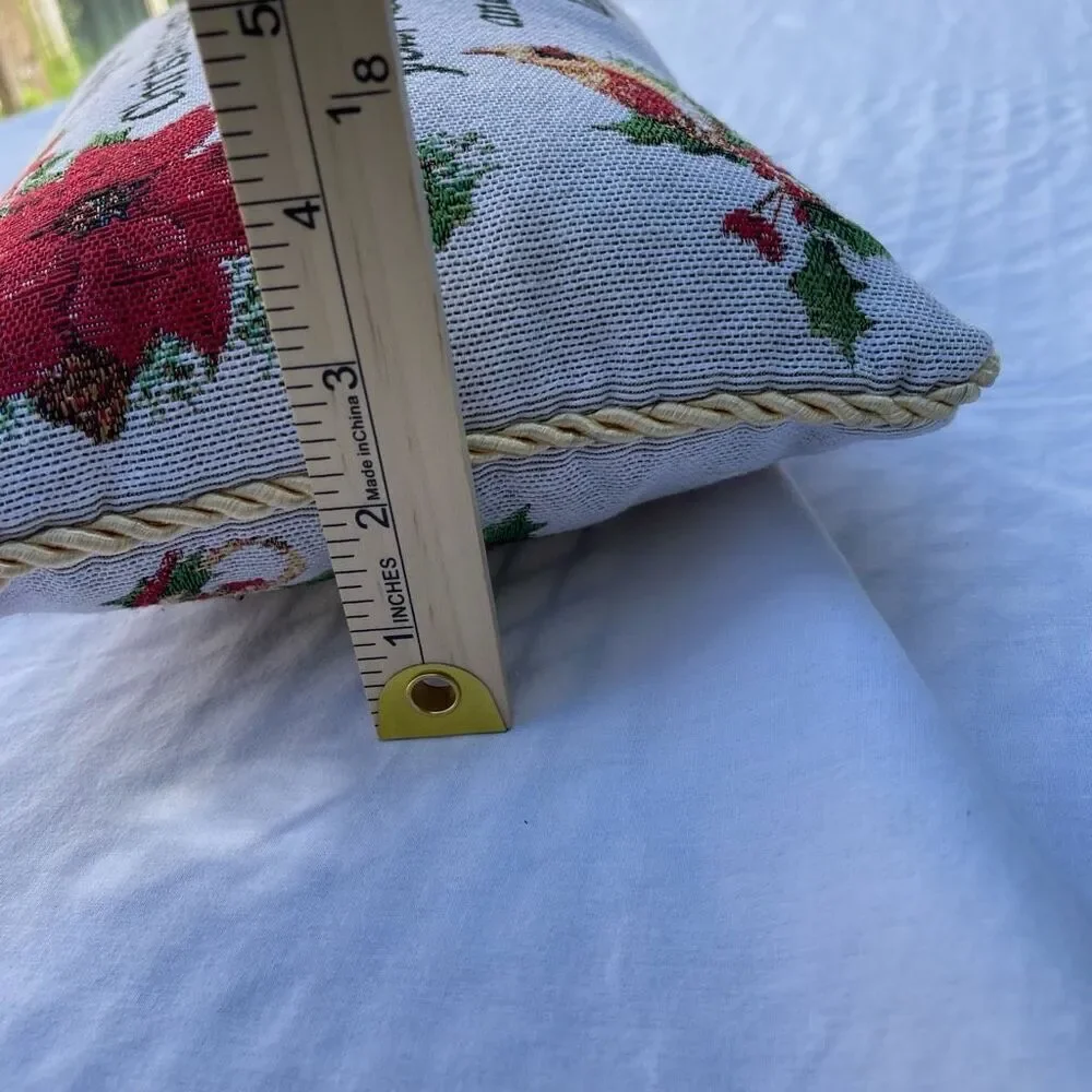 Small tapestry Christmas pillow Poinsettia graphic